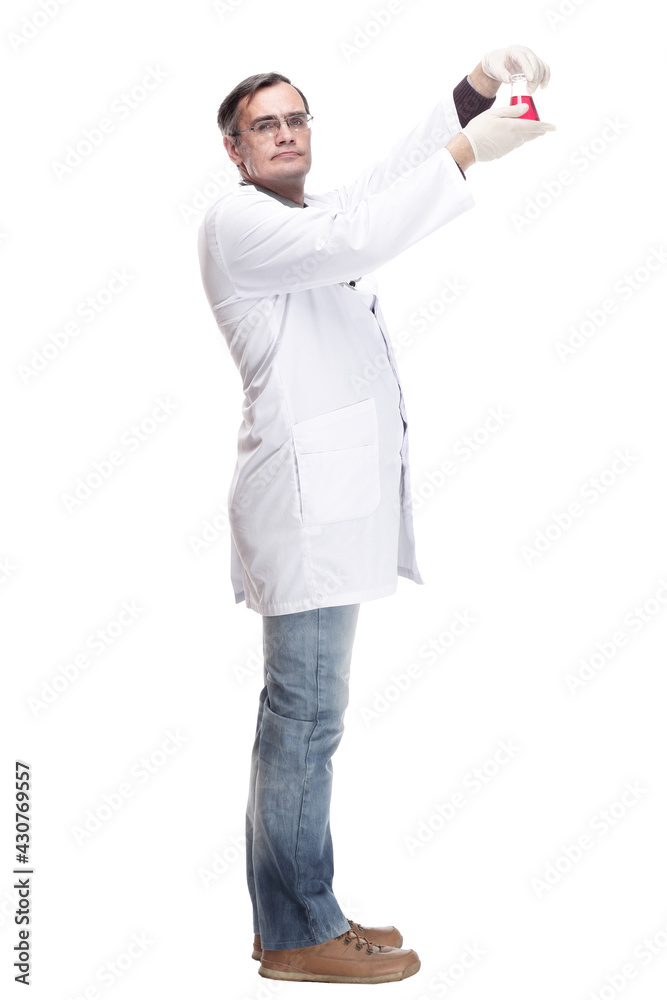 serious doctor with a laboratory flask in his hands . serious doctor with a laboratory flask in his hands .