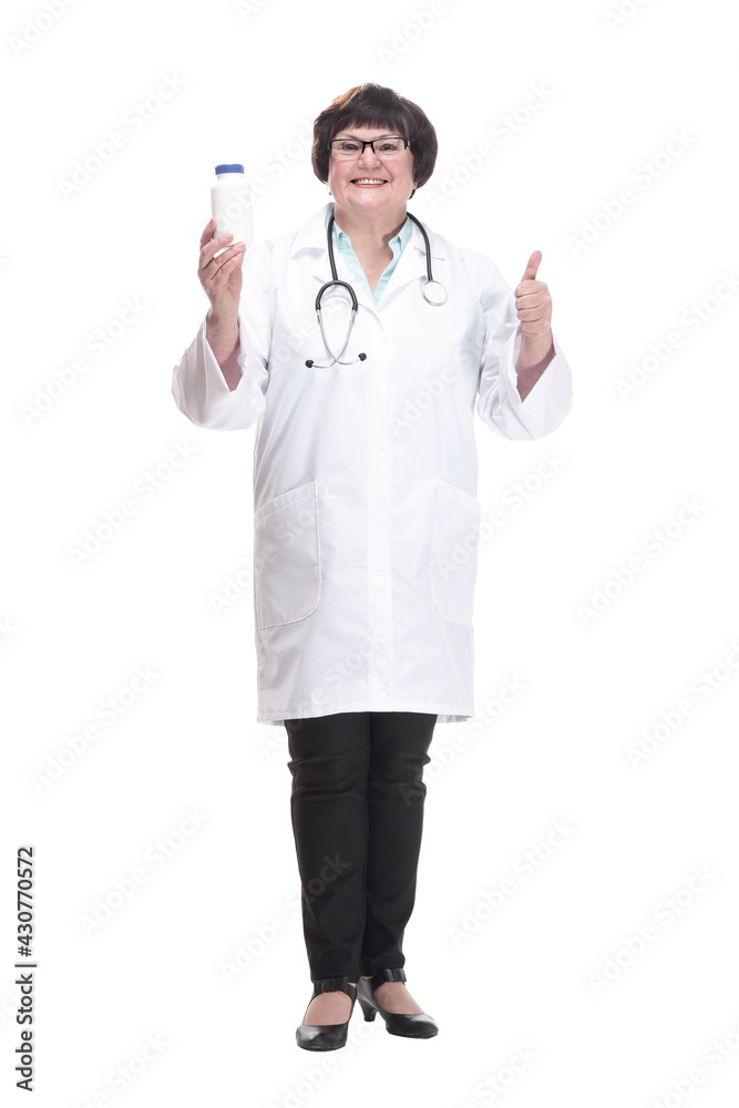 in full growth. senior female doctor with sanitizer in hand . in full growth. senior female doctor with sanitizer in hand .
