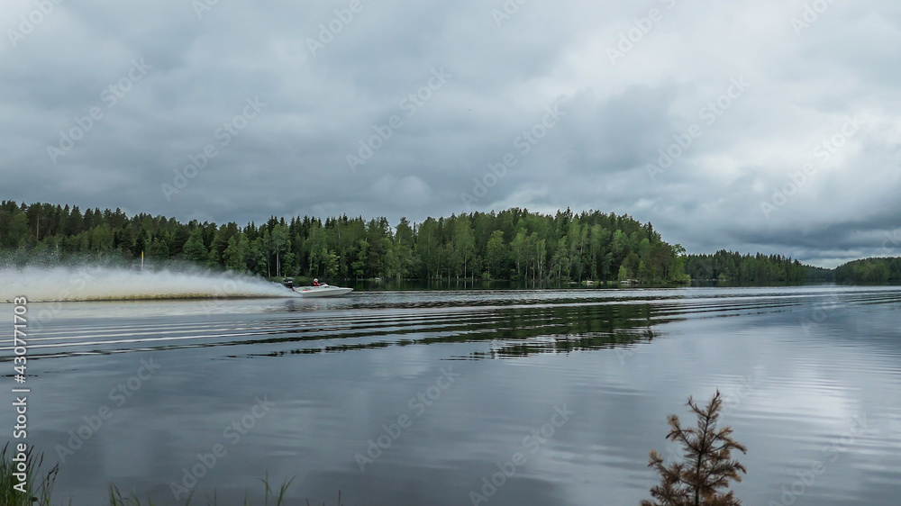 Fototapeta premium Formula speedboat on the lake in Finland. 