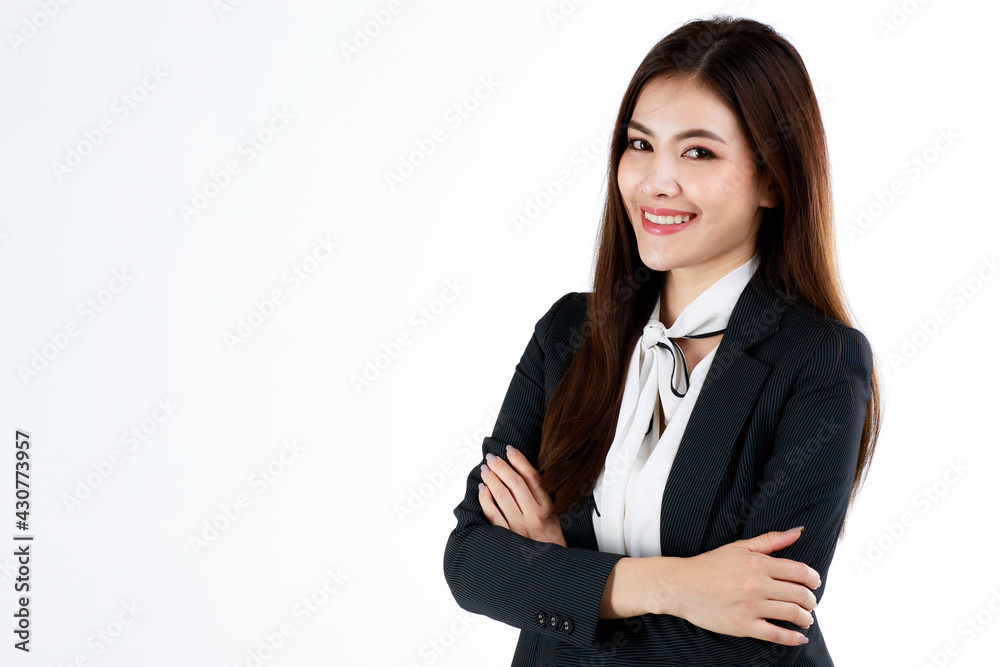Portrait of young Asian businesswoman in formal black suit dress posing with gorgeous and elegant style in friendly and self-confidence gesture, studio shot on white background Portrait of young Asian businesswoman in formal black suit dress posing with gorgeous and elegant style in friendly and self-confidence gesture, studio shot on white background