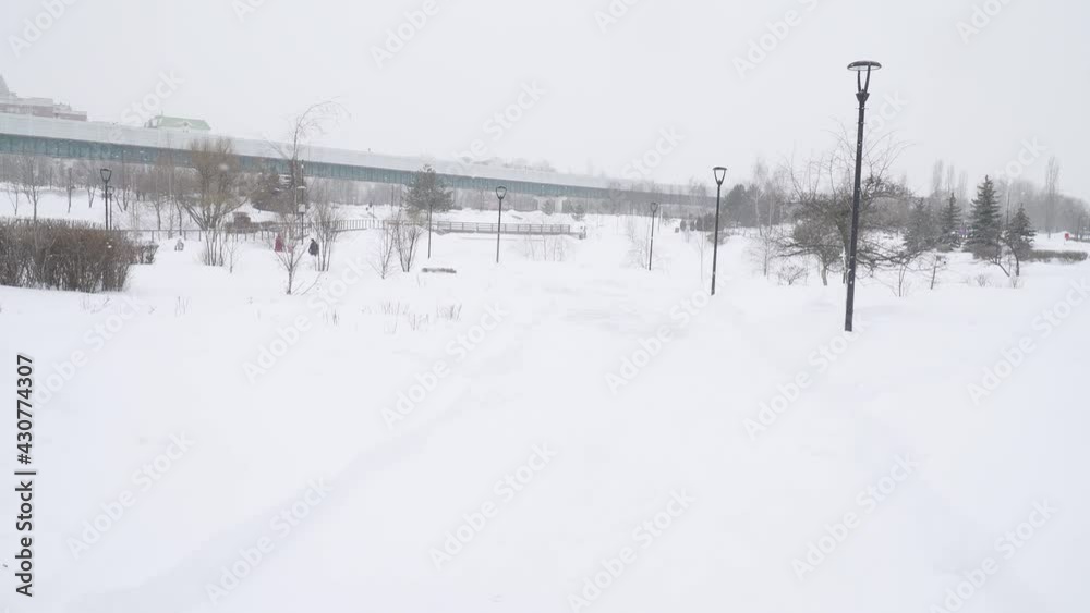 Cleaned paths in a park after a heavy snowfall in a residential area of the city of Moscow Yuzhnoye Butovo Cleaned paths in a park after a heavy snowfall in a residential area of the city of Moscow Yuzhnoye Butovo