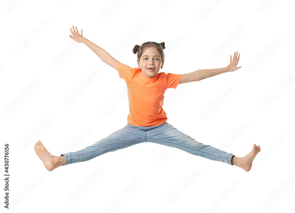 Cute little girl jumping on white background