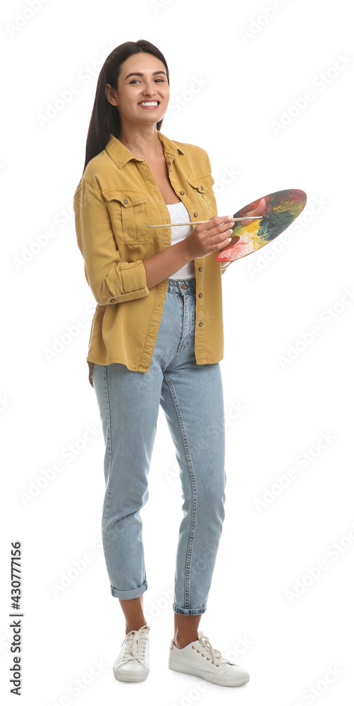 Young woman drawing with brush on white background Young woman drawing with brush on white background