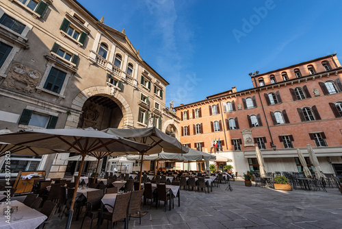 Verona, Piazza dei Signori also known as Piazza Dante, a square in the historic center of the city with its restaurants and bars. UNESCO world heritage site, Veneto, Italy, Europe.