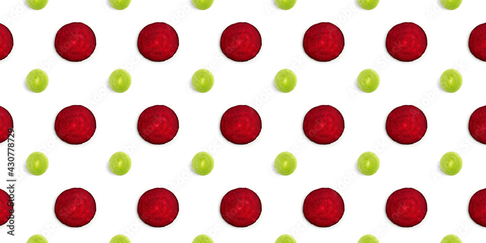 Slices of beet and leek - food pattern background Slices of beet and leek - food pattern background