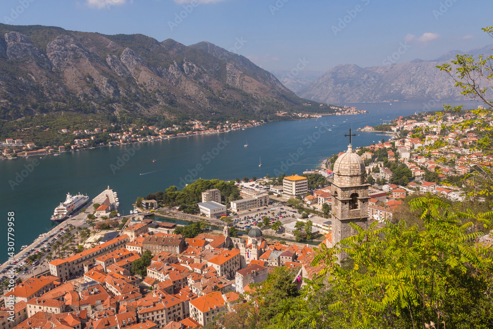 Wonderful view of the bell tower of the Church of Our Lady of Remedy standing on a hill in the town of Kotor. Montenegro 