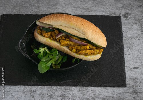 chicken curry Sandwich with salad