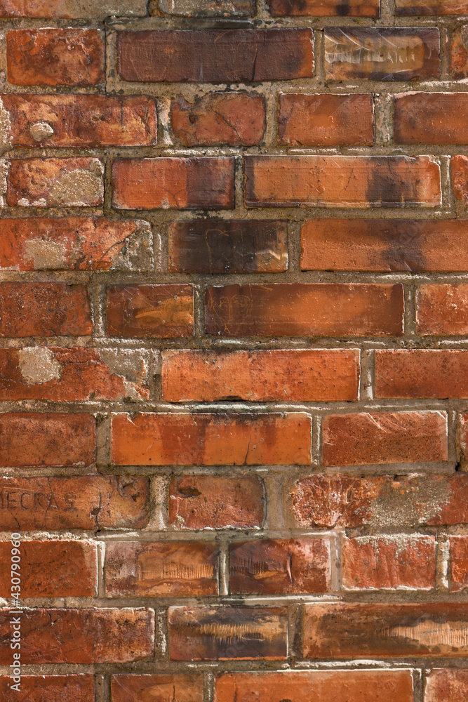 brick red wall. background of a old brick house.
