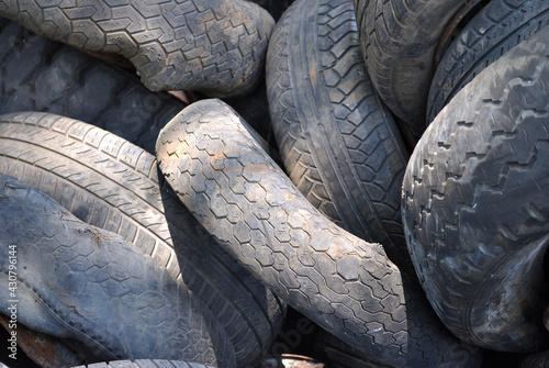 Discarded Pile of Old Worn Rubber Automotive Tyres 