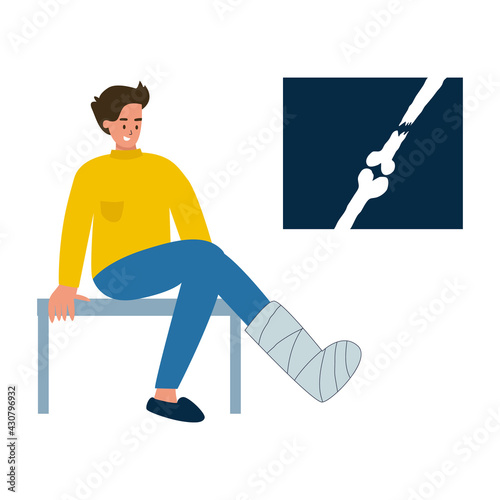 A man with a broken leg is sitting at the doctor. The leg is in a cast, a picture of the fracture