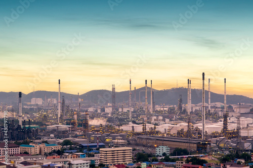 Oil refinery with tube and oil tank along twilight sky at Si Racha District, Rayong © Southtownboy Studio