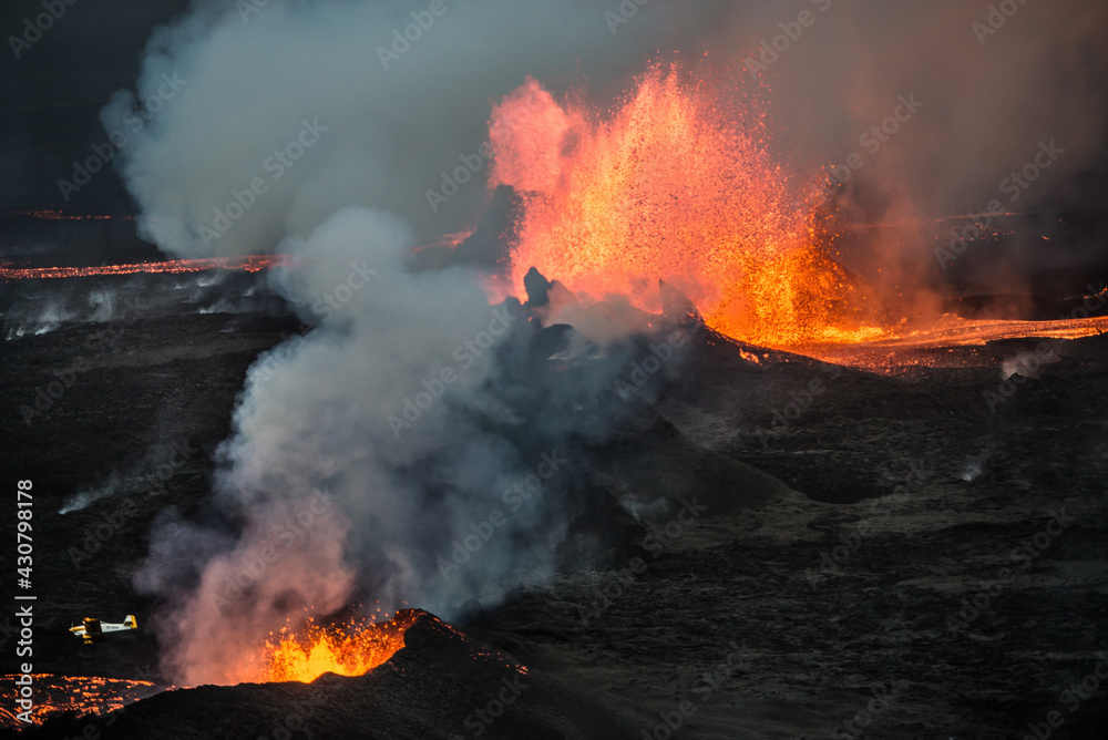 Aerial view of a small aircraft flying over the 2014 Bárðarbunga eruption at the Holuhraun volcanic fissures, Central Highlands, Iceland.	
