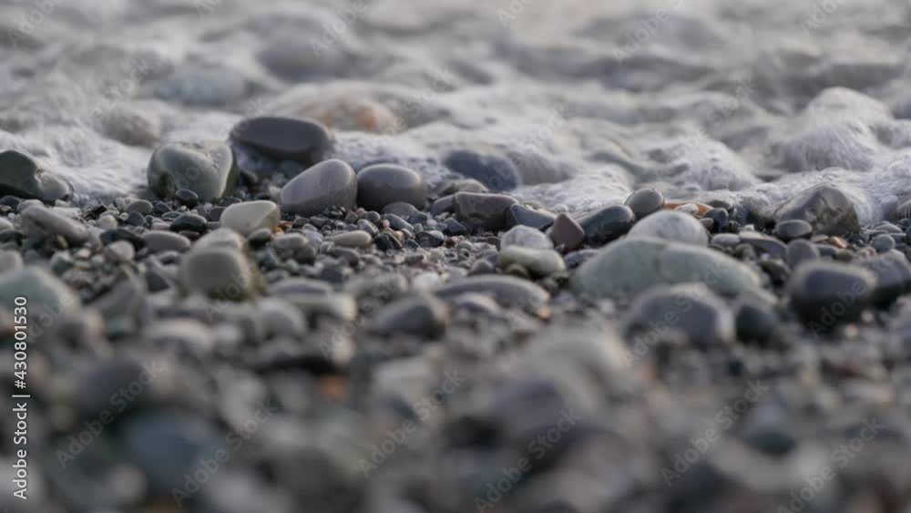 Waves on the Sea Shore. Stones on the beach. Pebble Beach. Waves on the Sea Shore. Stones on the beach. Pebble Beach.