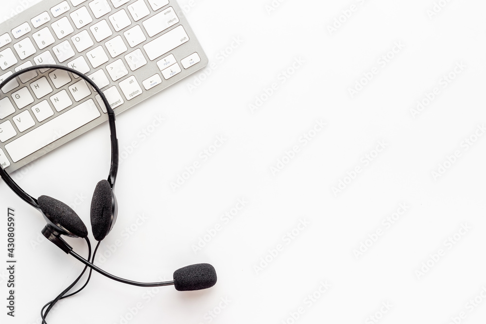 Voip headset on computer laptop. Hotline or call center support Voip headset on computer laptop. Hotline or call center support