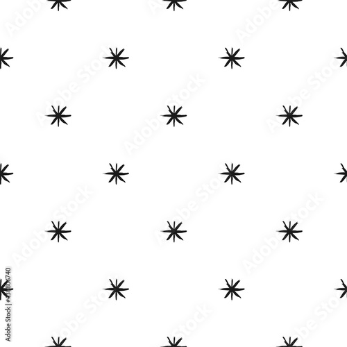 Seamless pattern with black hand drawn stars or asterisks on white background.