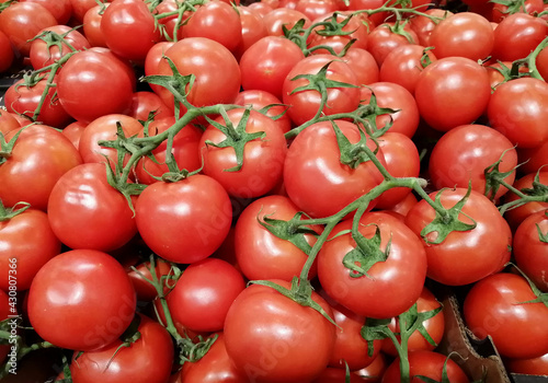 Lot of red ripe tomatoes. Harvest or supermarket concept