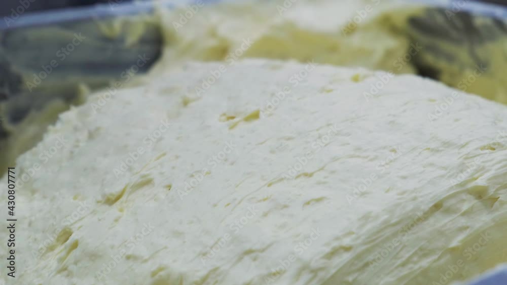 Butter Production Factory, Automated Line. Packing, Close Up. Food Manufacture Butter Production Factory, Automated Line. Packing, Close Up. Food Manufacture