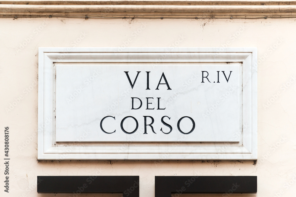 Obraz premium Via del Corso street sign on the main street of Rome, famous for shopping, Italy