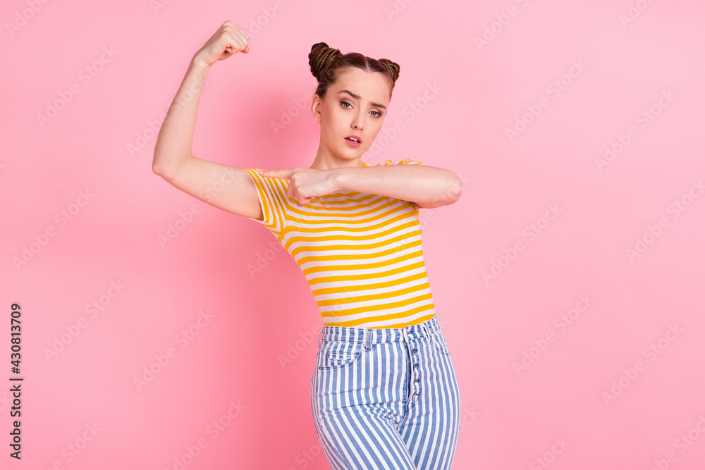 Photo of cool nice brunette lady point arm wear t-shirt pants isolated on pink background Photo of cool nice brunette lady point arm wear t-shirt pants isolated on pink background
