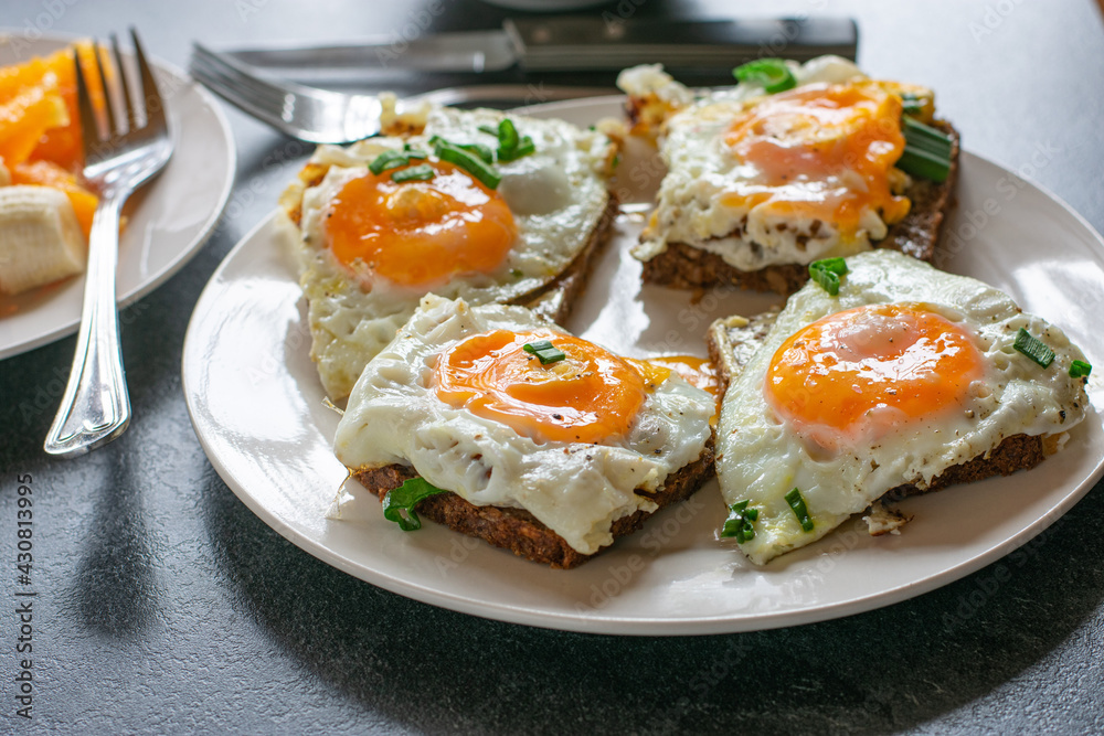 Breakfast with fried eggs and bread