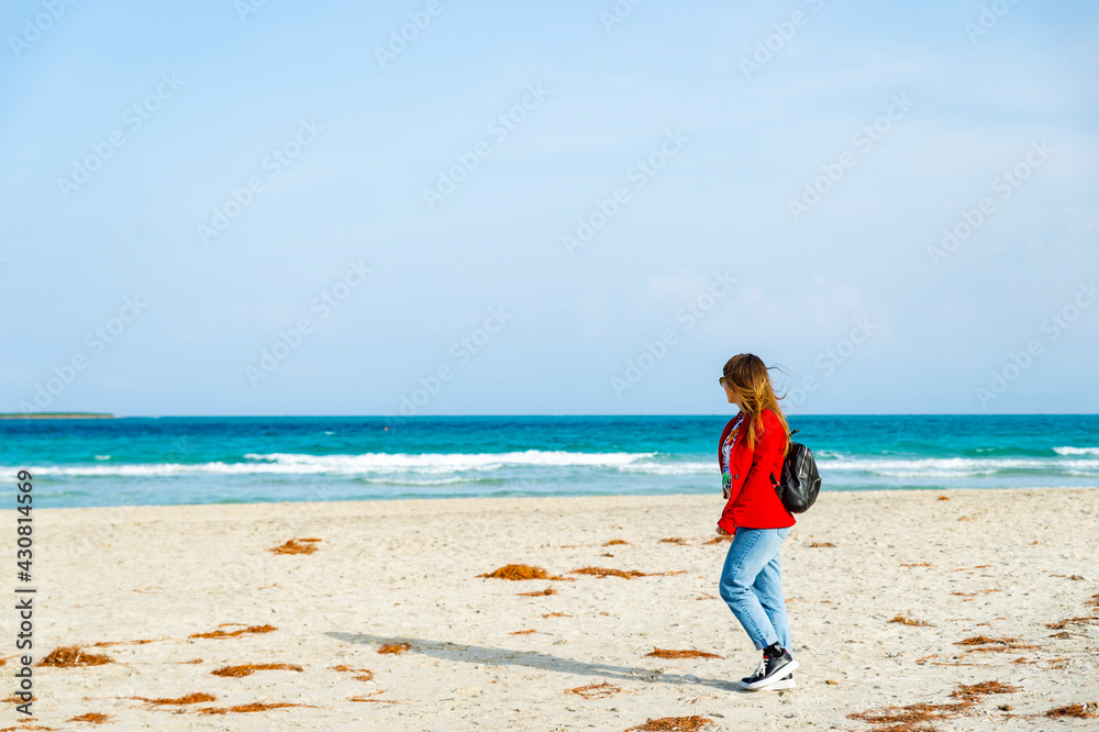 A person standing on a beach A person standing on a beach