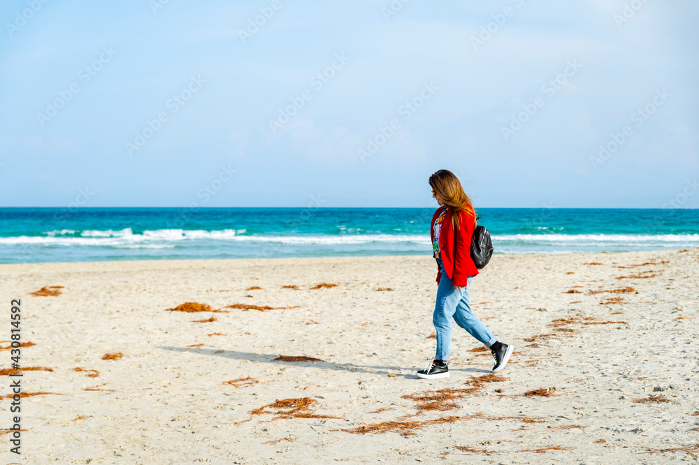 A person standing on a beach