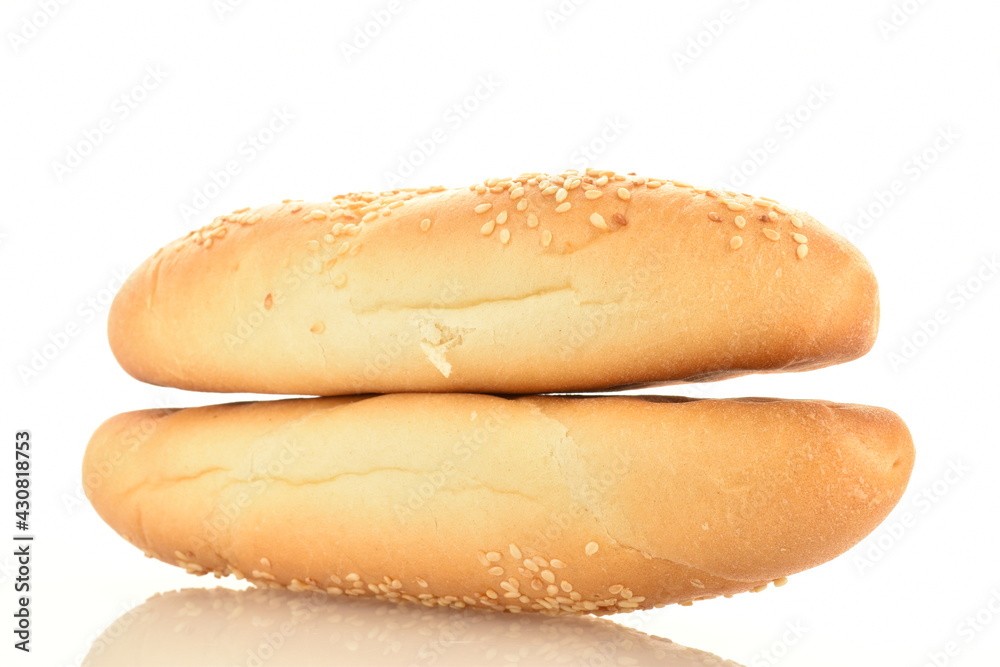Two delicious fragrant bagels with a jute napkin, close-up, isolated on white. Two delicious fragrant bagels with a jute napkin, close-up, isolated on white.