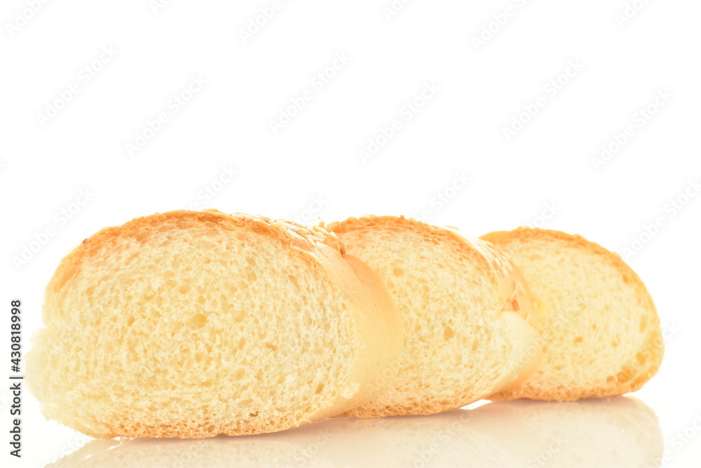 Three slices of fragrant bagels sprinkled with sesame seeds, close-up, isolated on white. Three slices of fragrant bagels sprinkled with sesame seeds, close-up, isolated on white.