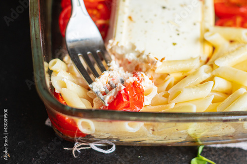 fetapasta penne tomato spices, feta cheese feta pasta second course snack trend meal copy space rustic food background top view photo