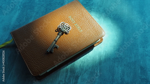 Key and bible on grey marble. Concept bible is key of life.  Key  Salvation is in bible.  Invaluable of God's word. Bible key success.  Christianity background.