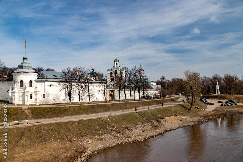 Yaroslavl White Stone Kremlin on a sunny spring day panoramic view of the Kotorosl River bank and the Chapel of the Kazan Icon of the Mother of God.
