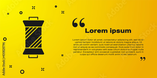 Black Sewing thread on spool icon isolated on yellow background. Yarn spool. Thread bobbin. Vector