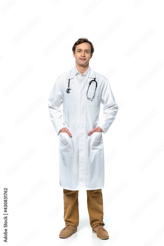 Doctor in white coat looking at camera on white background Doctor in white coat looking at camera on white background