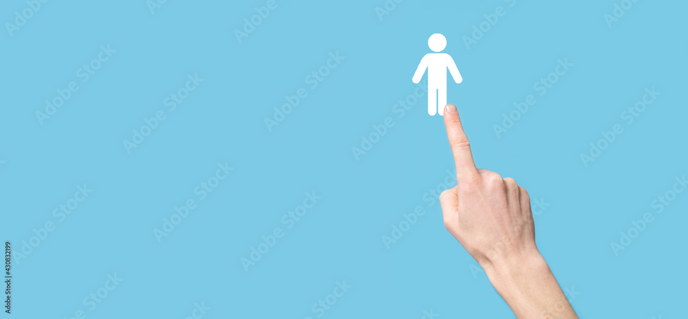 Male hand holding human icon on blue background. Human Resources HR management Recruitment Employment Headhunting Concept.Select team leader concept. Male hand click on man icon.Banner ,copy spase. Male hand holding human icon on blue background. Human Resources HR management Recruitment Employment Headhunting Concept.Select team leader concept. Male hand click on man icon.Banner ,copy spase.