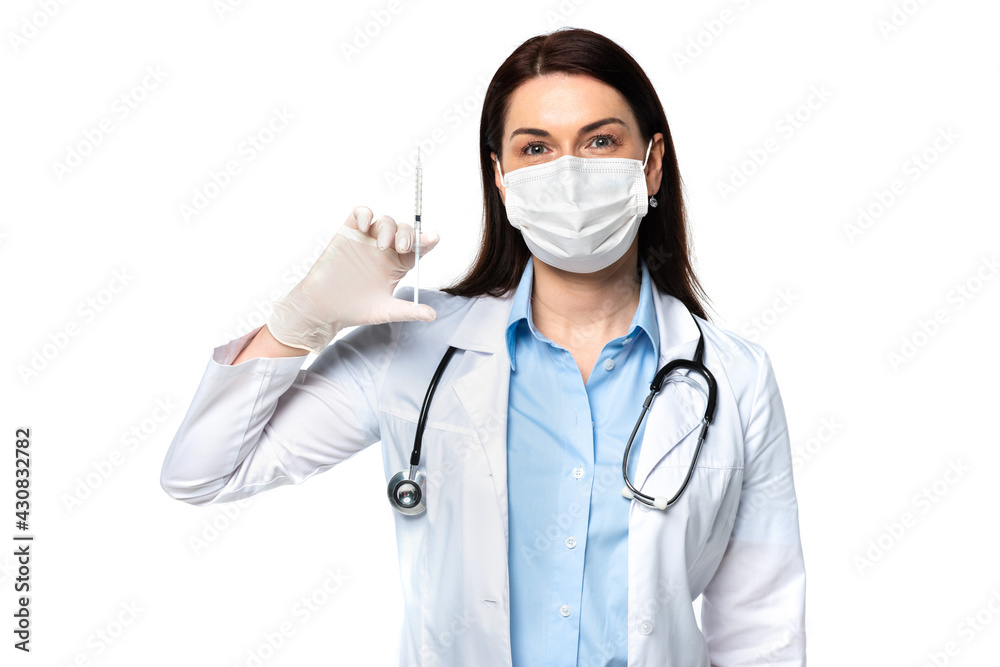 Doctor in latex glove and medical mask holding syringe isolated on white Doctor in latex glove and medical mask holding syringe isolated on white