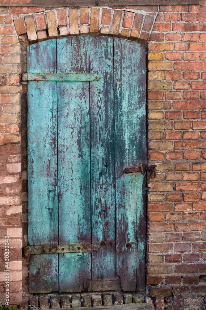 Naklejka premium Old Wooden Door With Patina