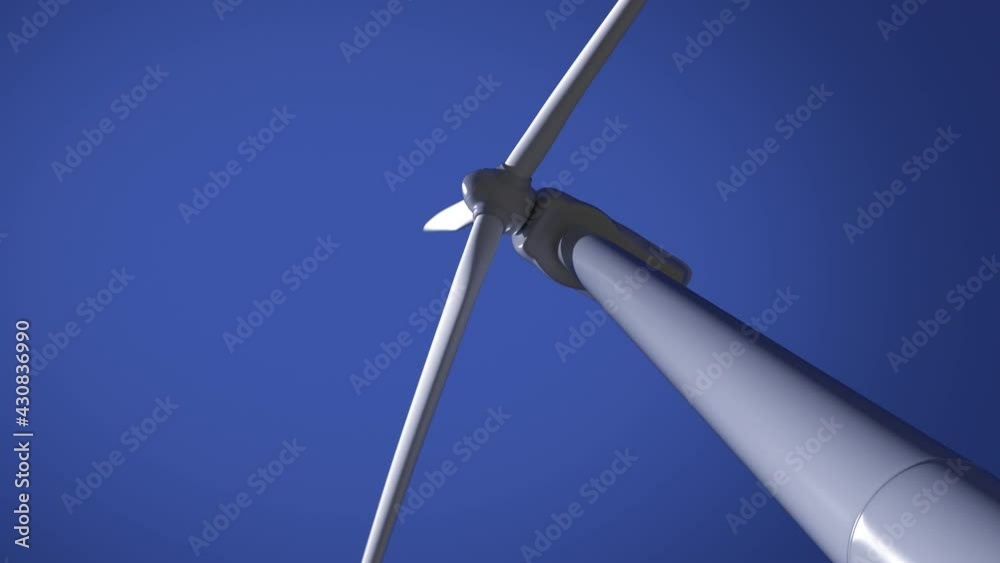 Bottom view of working wind turbine power generator against clear blue sky, loop Bottom view of working wind turbine power generator against clear blue sky, loop