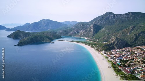 Amazing beautiful panoramic view from drone of natural park of Oludeniz and Fethiye blue lagoon and tranquil aquamarine dead sea.

