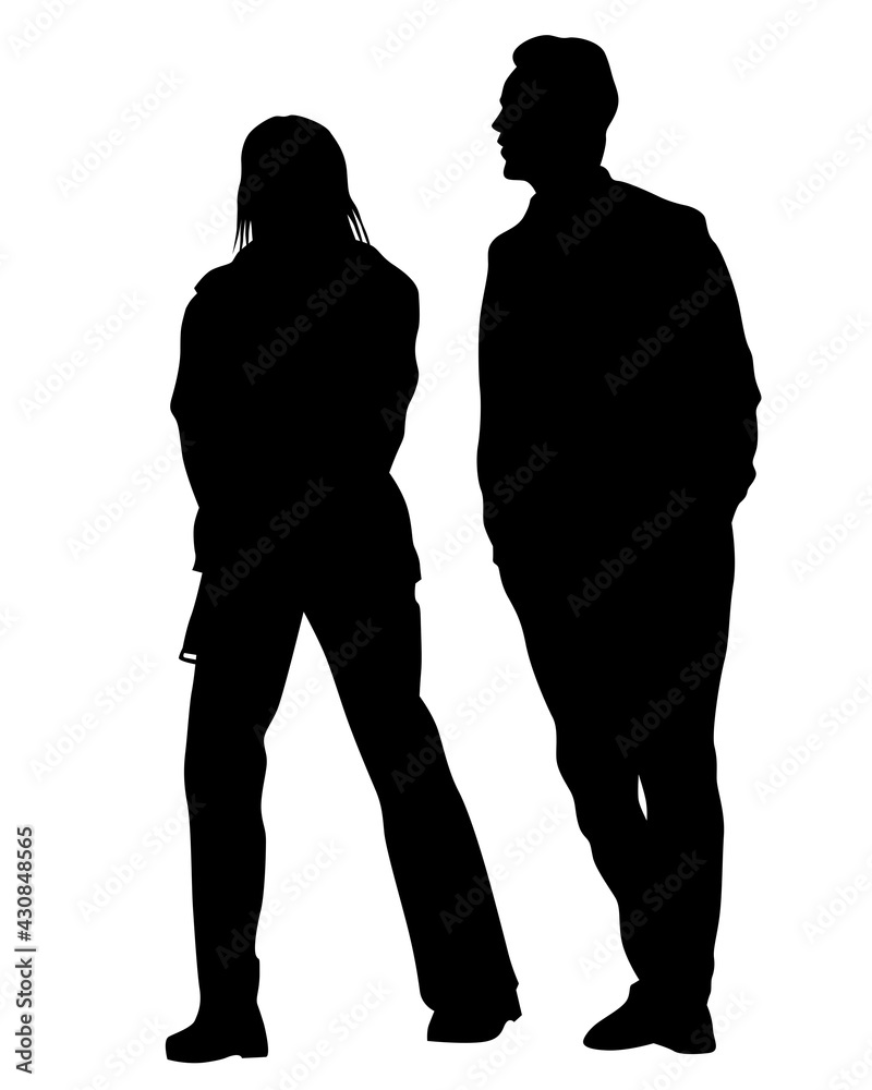 Young man and woman are standing next to each other. Isolated silhouette on a white background Young man and woman are standing next to each other. Isolated silhouette on a white background