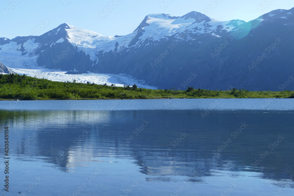 Portage Lake with glacier, popular hiking and tourist guided tour destination, Kenai Fjords National Park, Alaska, United States