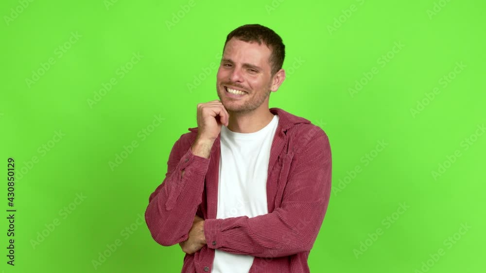 Brazilian handsome man standing and looking to the side over isolated background Brazilian handsome man standing and looking to the side over isolated background