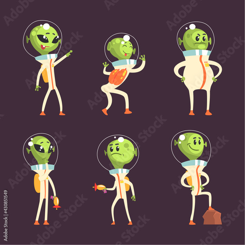 Cute Green Alien Visitors in Space Suits Smiling and Posing Vector Set