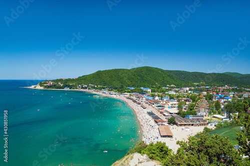 Fototapeta Naklejka Na Ścianę i Meble -  View on the beach and the village of Arkhipo-Osipovka on the Black Sea coast