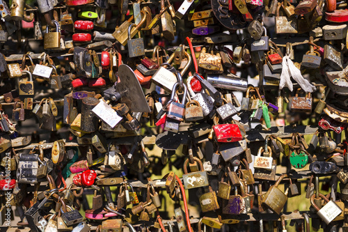 lot of locks, different color and the size. A wall of the closed locks.