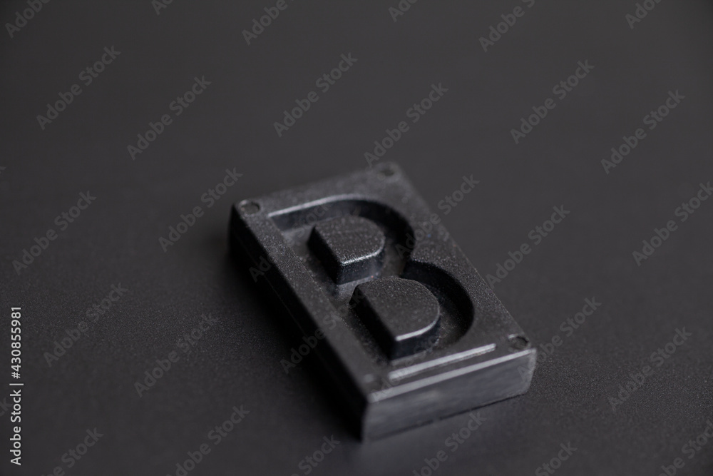 Letter Press B on black background Letter Press B on black background