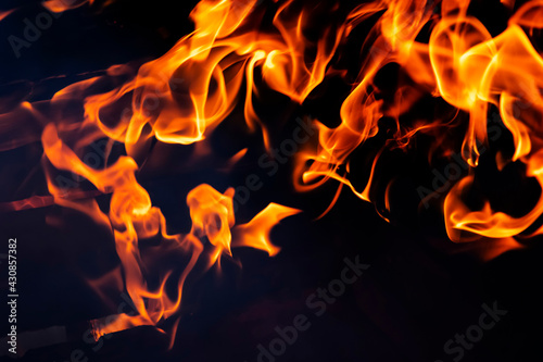 Fire texture on a black background, close up