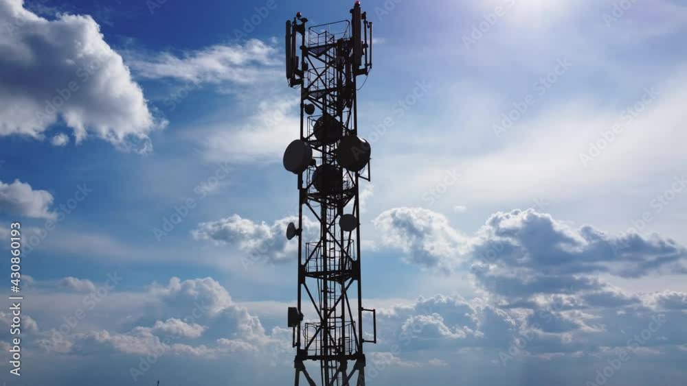 Aerial view of the telecommunications tower. Wireless Communication Antenna Transmitter. Cell phone, radio of cellular 5g 4g signal.
