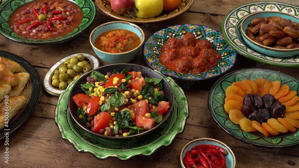 Eid mubarak, Ramadan table. Festive traditional Middle Eastern Muslim Halal foods. Celebration of Eid al-Adha
