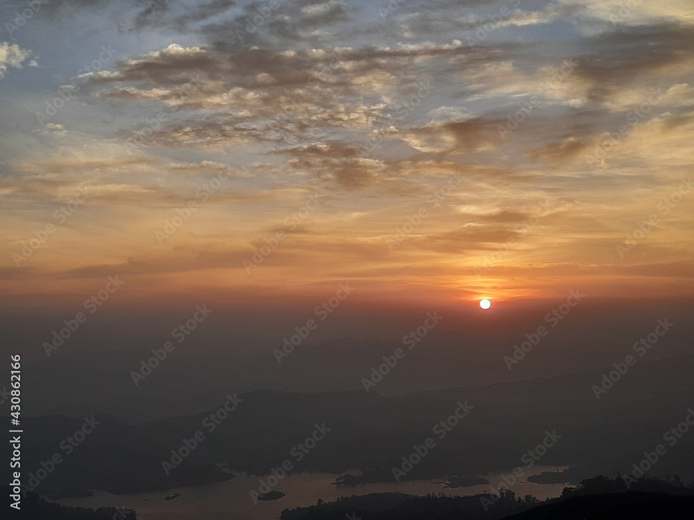 sunrise over the mountains in Adam's peak Sri Lanka