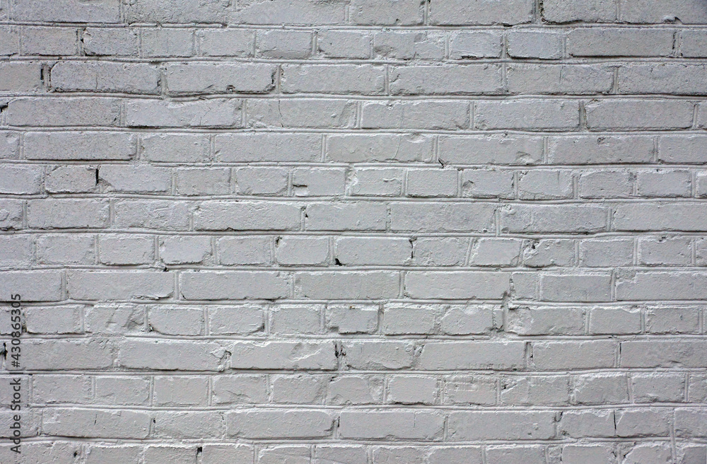 Brick wall painted in white.